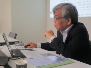 報告する町田隆吉氏